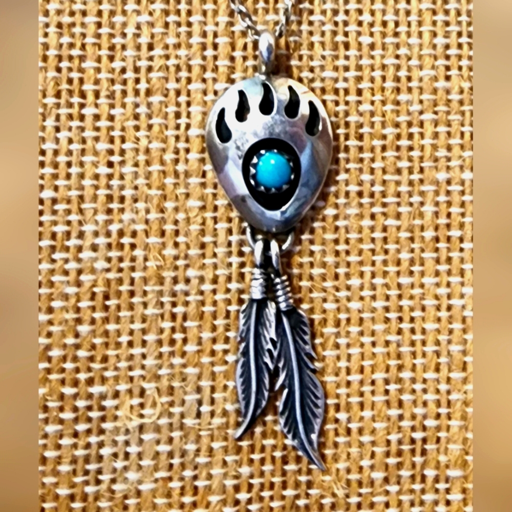 Sterling silver Bear paw pendant necklace.